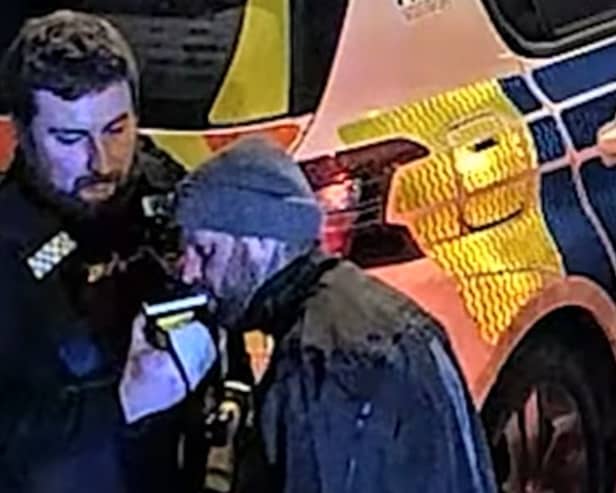 Gavin Twist does a breathalyser test.