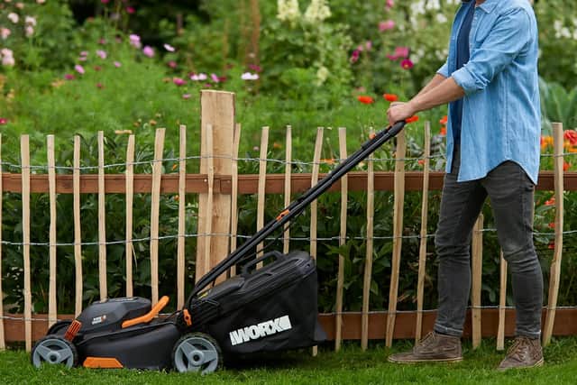 WORX WG927E cordless lawnmower and trimmer twin pack with batteries and charger