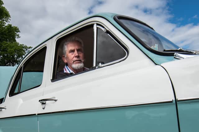 Dennis in his Wolesley classic car. Photo Credit: Lucinda Herbert