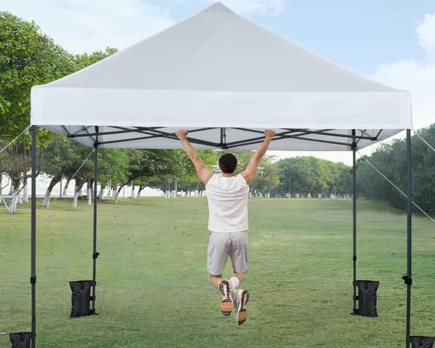 The pop-up gazebo is made of steel and designed for all weathers