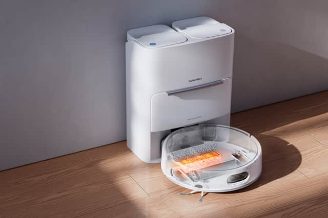 The multi-function base station cleans the mops and dries them, at the same time as topping up the detergent and emptying the waste tank - it's compact and clever, but a tad noisy