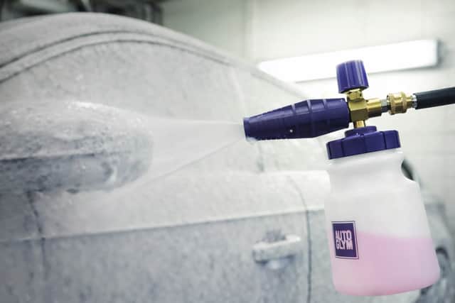 Apply it using a detergent bottle on your jet wash, or a pressure bottle - and then just rinse it off again