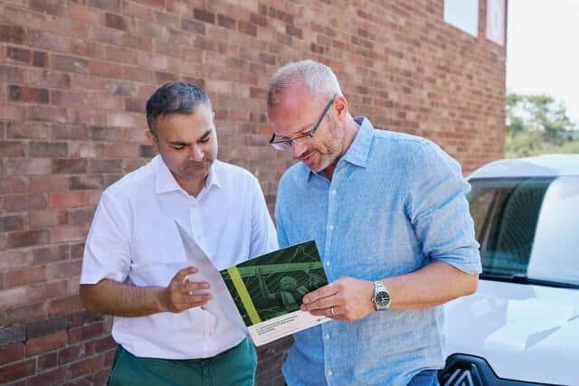 Glenfield Electrical Managing Director Phil Houlder welcomes Mid-Leicestershire MP Peter Bedford to the company's Glenfield headquarters.