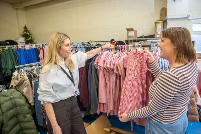 The LCH Charity team organising school uniforms to be donated to families in need