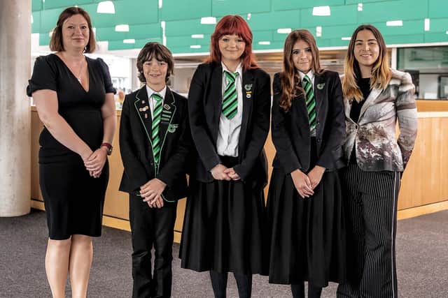 Fiona Bray, Bellway East Midlands Sales Manager, with winning students Sebastian Fresia-Farrelly, Hope Revitt and Abbie Dales, and Curriculum Lead of Art Mrs Sanger