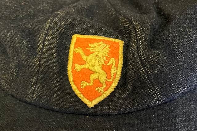 A 1951 school cap and badge 