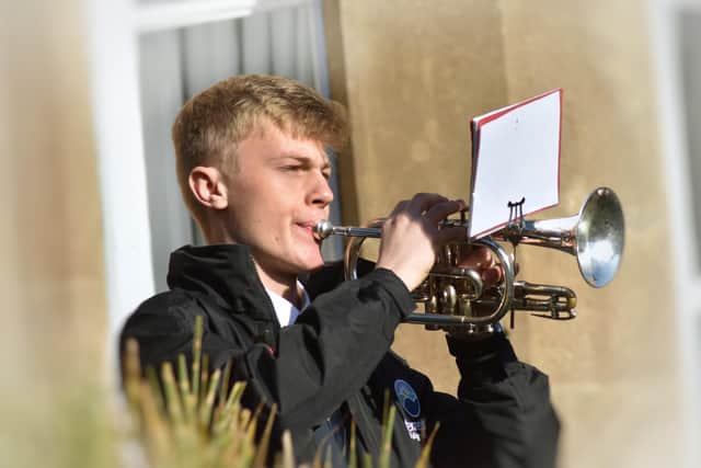 The Last Post is sounded by Stephen Wilson in Memorial Gardens on Remembrance Sunday in Melton EMN-191111-103319001