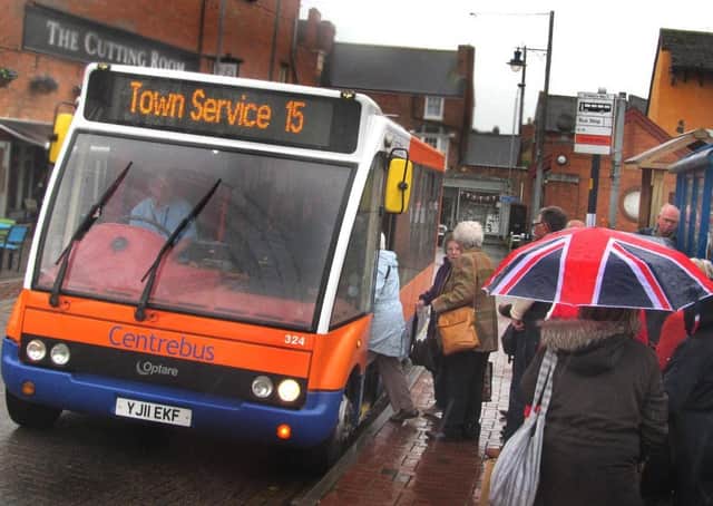 A Centrebus bus picks up passengers in St Mary's Way, Melton EMN-191113-125521001