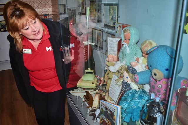 Customer Liaison Assistant Jacki Wheat checks out the new Ladybird Books exhibition at Melton Carnegie Museum EMN-200122-122719001