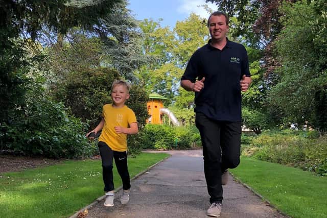 Rob Peet and step-son Christopher Mooney embark on one of the young boy's 41 one-mile run/walks for LOROS EMN-200227-130826001