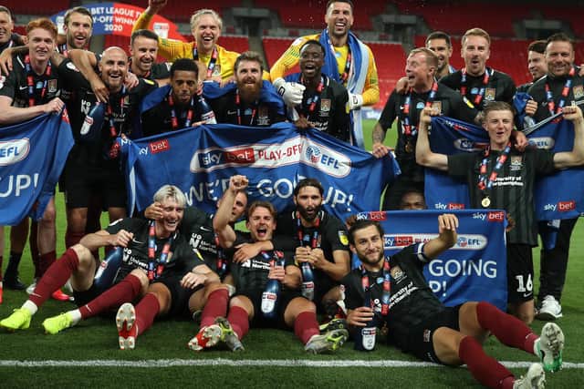 Anderson celebrates with his Cobblers teammates. Photo: GattyImages