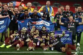 Anderson celebrates with his Cobblers teammates. Photo: GattyImages