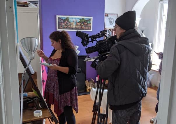 The cameras roll as artist Lucy Cortese perfects some work for BBC programme Home Is Where The Art Is EMN-200713-131400001