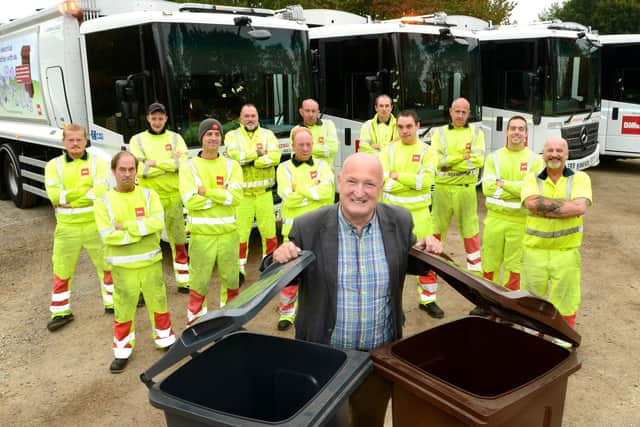 Melton Council leader, Councillor Joe Orson, with some of the authority's waste collection teams EMN-200907-154952001