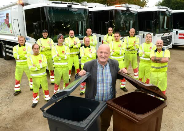 Melton Council leader, Councillor Joe Orson, with some of the authority's waste collection teams EMN-200907-154952001