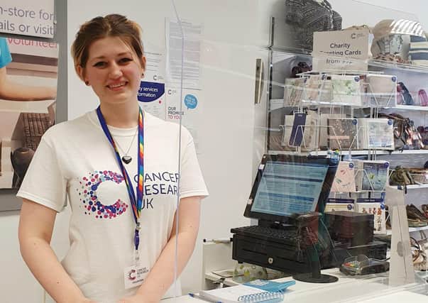 Breidh Wharton (19) , a volunteer at Melton's Cancer Research UK shop which has now reopened EMN-201007-111446001