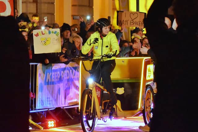 Team Rickshaw member Adelle (17), from Belfast, who has passed away after a battle with cancer, pictured riding the rickshaw along Nottingham Street in Melton live on The One Show last November EMN-200716-115147001