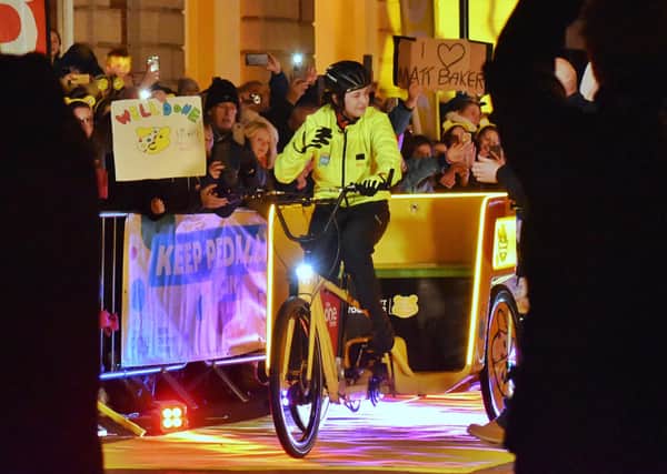 Team Rickshaw member Adelle (17), from Belfast, who has passed away after a battle with cancer, pictured riding the rickshaw along Nottingham Street in Melton live on The One Show last November EMN-200716-115147001