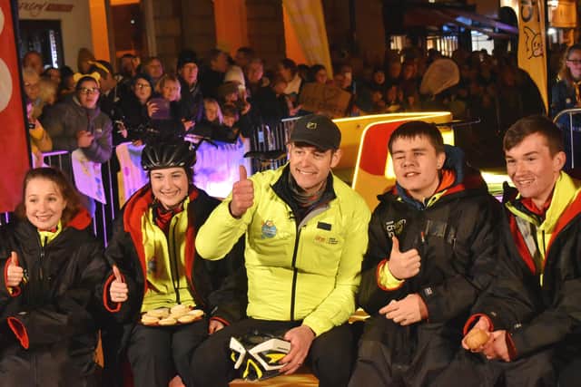 Matt Baker and the Rickshaw Challenge team members pose for photographer Tim Williams after completing leg six from Matlock Bath to Melton - sadly Adelle, to the right of Matt, has passed away after a battle with cancer EMN-200716-115204001