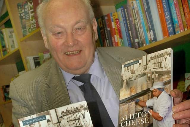 Trevor Hickman signs copies of his history of Stilton Cheese book back in 2012 at Melton Bookshop PHOTO: Tim Williams EMN-200727-180448001
