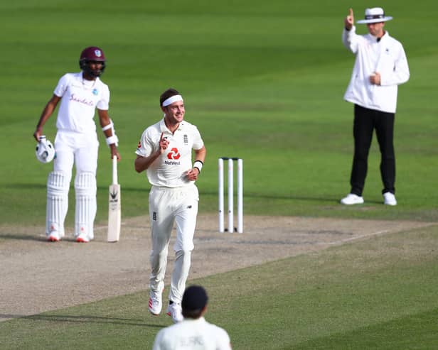 MANCHESTER, ENGLAND - JULY 26: Stuart Broad of England celebrates after taking the wicket of Kemar Roach of West Indies during Day Three of the Ruth Strauss Foundation Test, the Third Test in the #RaiseTheBat Series match between England and the West Indies at Emirates Old Trafford on July 26, 2020 in Manchester, England. (Photo by Michael Steele/Getty Images) 775534511