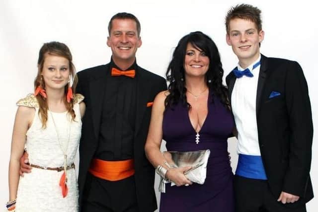 The late Stewart Sparling pictured at a function with wife Angie and children Lewis and Caitlin EMN-200408-152534001