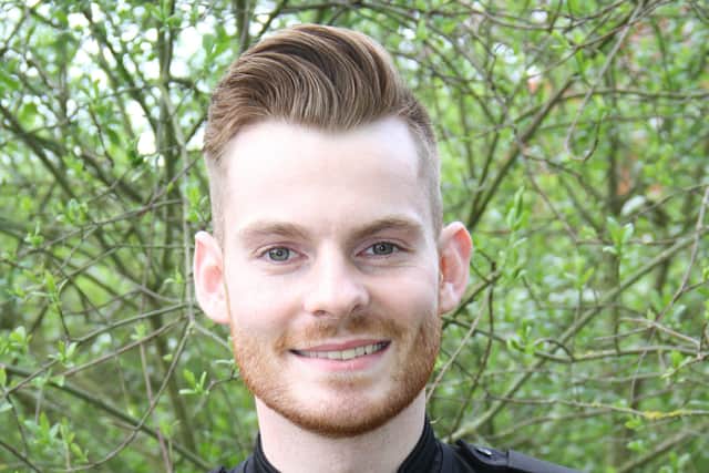 Pc Lewis Sparling, who has suceeded his late father by serving in the Leicestershire Police force, wearing the same collar number EMN-200408-150422001