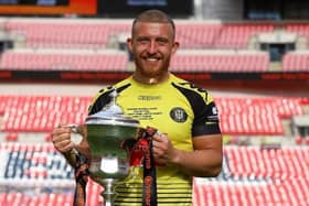 George Thomson, who grew up in Melton, pictured with the National League play-off final trophy at Wembley following Harrogate Town's victory EMN-200508-121949001