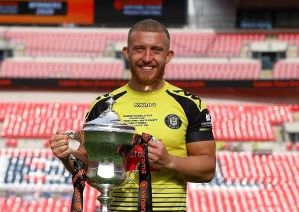 George Thomson, who grew up in Melton, pictured with the National League play-off final trophy at Wembley following Harrogate Town's victory EMN-200508-121949001
