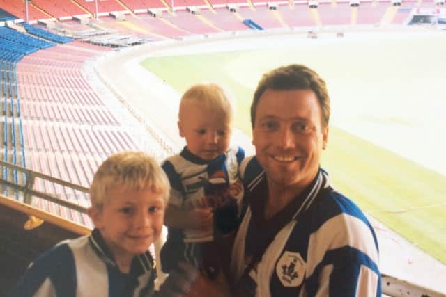 George Thomson on a visit to Wembley aged five with his dad and brother EMN-200508-145116001