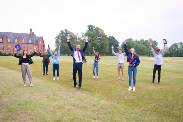 Students at Ratcliffe College celebrate their A-level results with headmaster, Jonathan Reddin EMN-200813-152609001