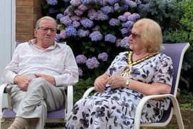 Leicestershire County Council chair, Pam Posnett, chats to her father-in-law, Jim Posnett, about his experiences fighting in the far east during the Second World War EMN-200813-172244001