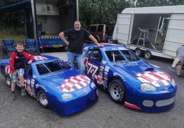 Oscar Dustan (9) with his racing car and sister Anna-May EMN-200814-162641001
