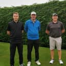 Golfers prepare to tee off at the Pork Pie Open.