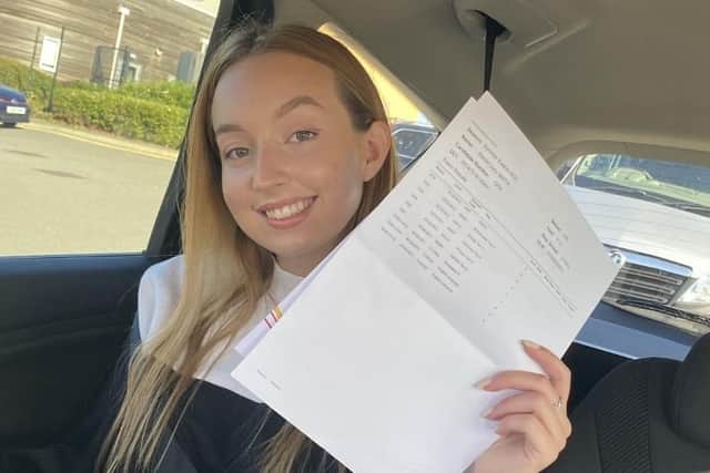 Harriet Smith, shows off her GCSE results - perfect 9 grades in her nine subjects EMN-200824-165806001