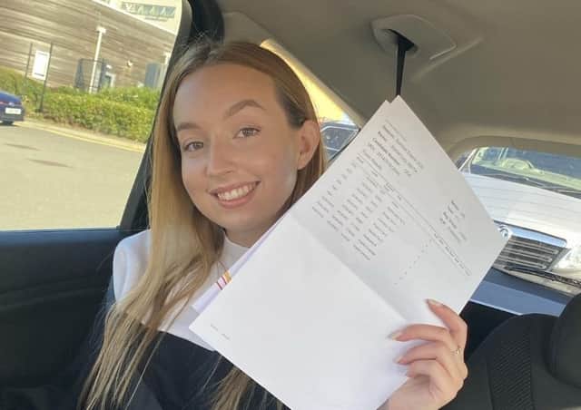 Harriet Smith, shows off her GCSE results - perfect 9 grades in her nine subjects EMN-200824-165806001