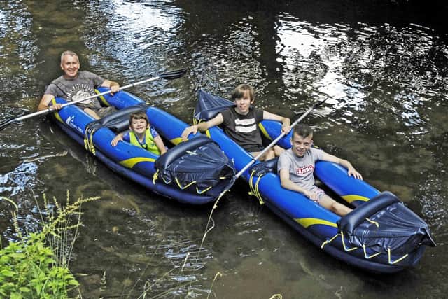 A father and sons enjoy a recent boating trip on the River Eye through Melton
PHOTO DEREK WHITEHOUSE EMN-200827-131359001