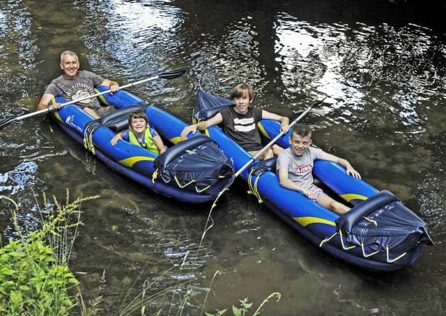 A father and sons enjoy a recent boating trip on the River Eye through Melton
PHOTO DEREK WHITEHOUSE EMN-200827-131359001