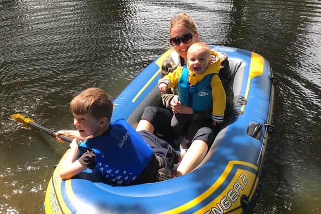 Kirsty Wells and children enjoy a boat trip on the River Eye in Melton EMN-200827-152206001