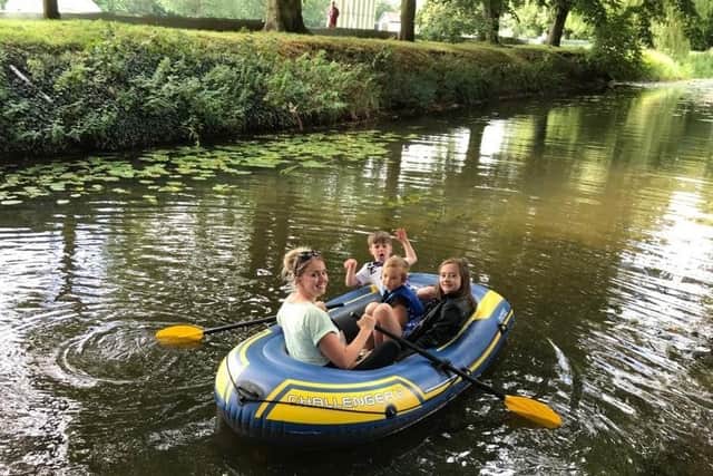 Kirsty Wells and children enjoy a boat trip on the River Eye in Melton EMN-200827-152156001