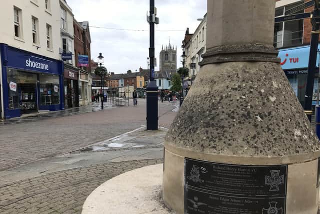 The corncross in Melton bearing a plaque paying tribute to celebrated Battle of Britain ace, Johnnie Johnson EMN-200909-100322001