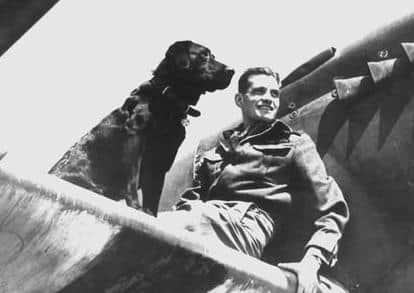 Second World War Spitfire pilot Johnnie Johnson with his beloved Labrador, Sally EMN-200309-185301001