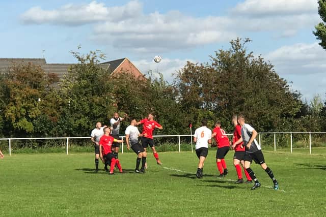 Action from Asfordby's win over Rothley.