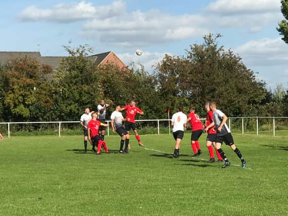 Action from Asfordby's win over Rothley.
