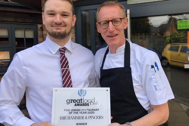 Staff at The Hammer and Pincers, at Wymeswold, show off their award for winning Fine Dining Restaurant of the Year for 2019/20 at the Great Food Club awards EMN-200923-133539001