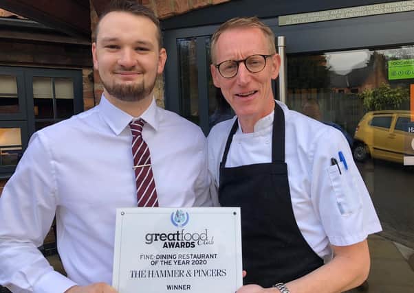 Staff at The Hammer and Pincers, at Wymeswold, show off their award for winning Fine Dining Restaurant of the Year for 2019/20 at the Great Food Club awards EMN-200923-133539001