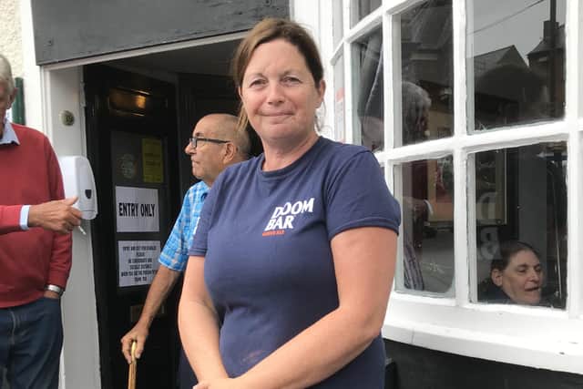 Sharon Brown, landlady of The Grapes pub, at Melton EMN-200923-123321001
