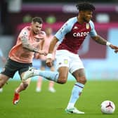 Burke gives chase at Aston Villa.  Photo: Getty Images