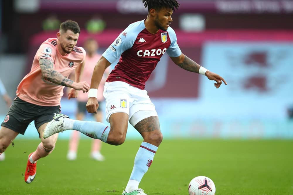 Burke gives chase at Aston Villa.  Photo: Getty Images