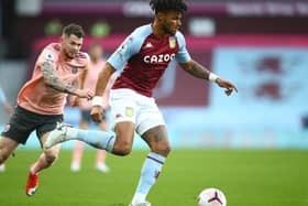 Burke gives chase at Aston Villa.  Photo: Getty Images